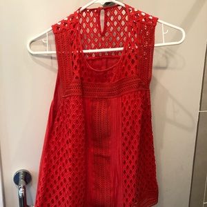 Orange Sleeveless top.